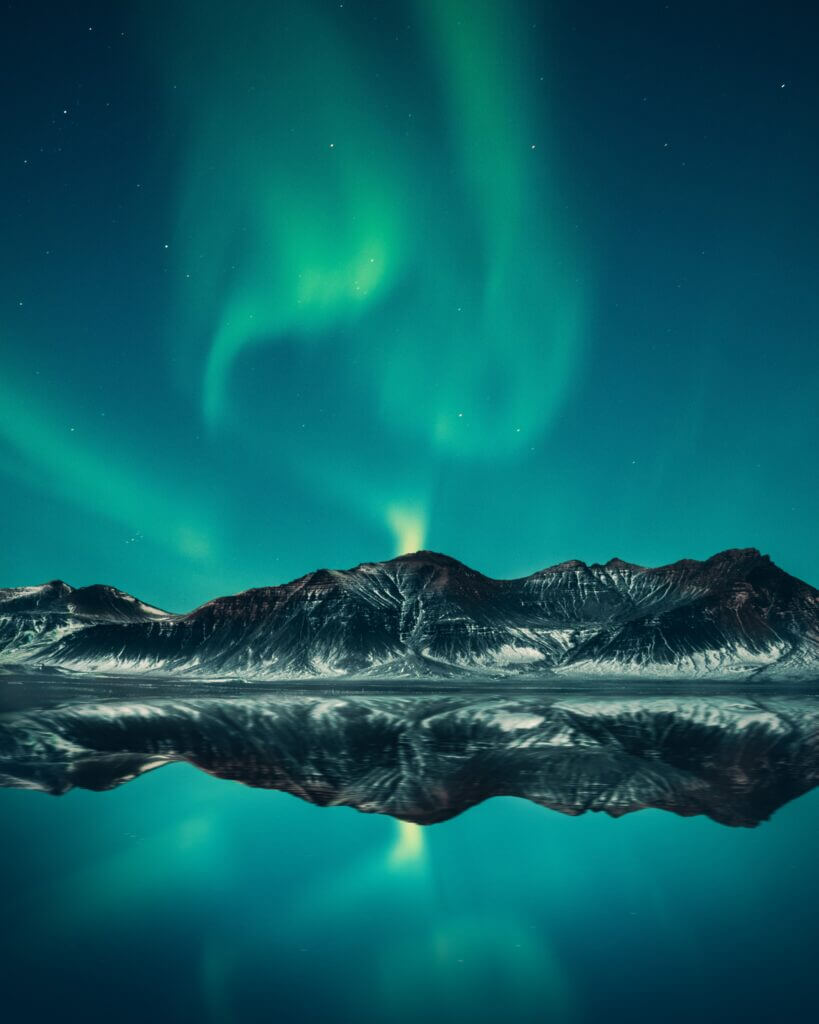 Tromso northern lights above a mountain