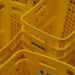 Yellow shopping baskets pile