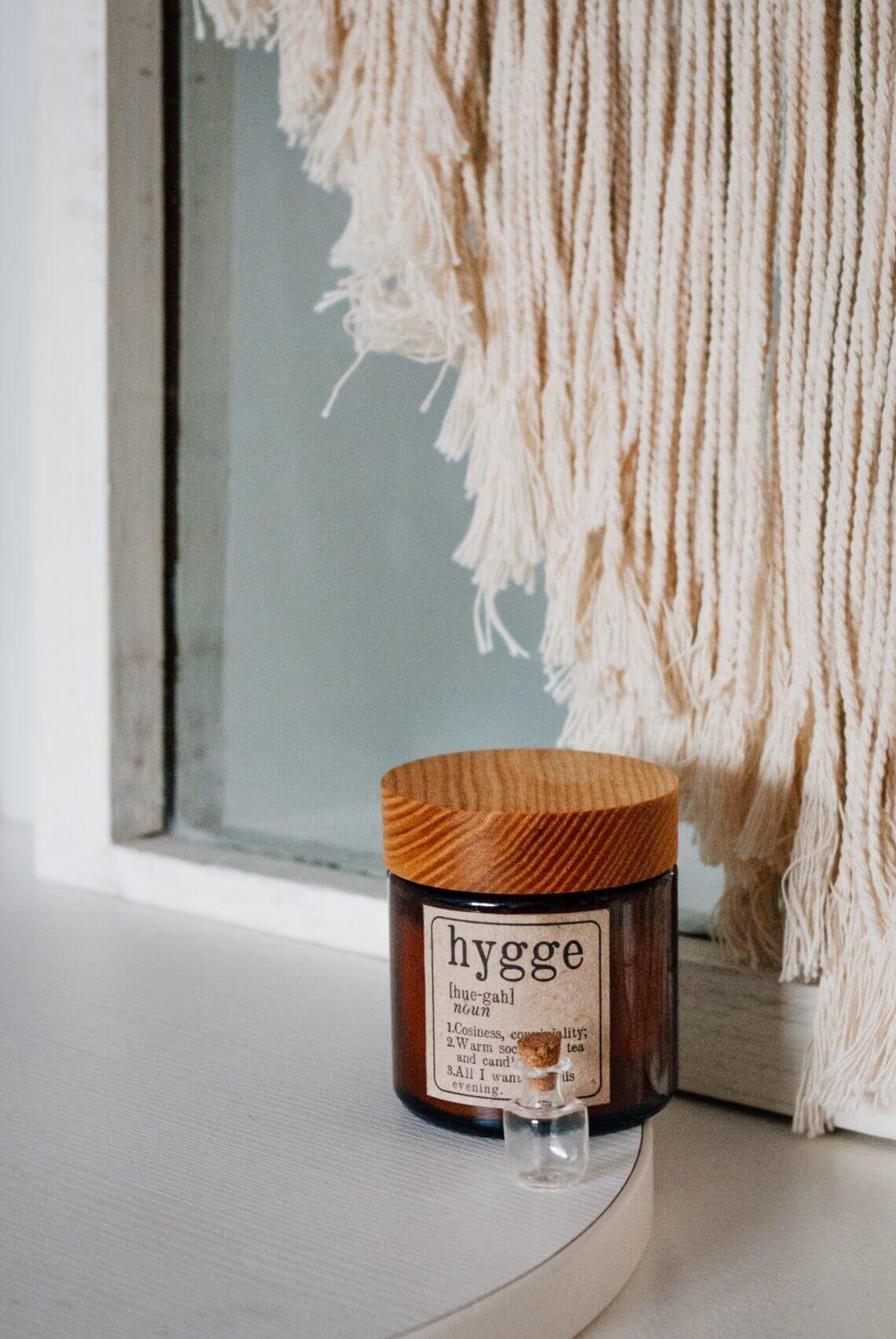 How to Master the Hygge Pronunciation candle with hygge pronunciation on label