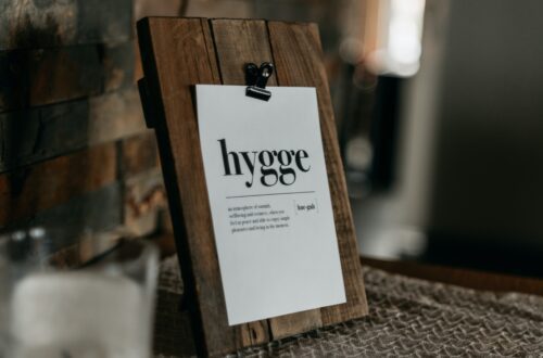 Sign on counter showing the hygge meaning in black and white