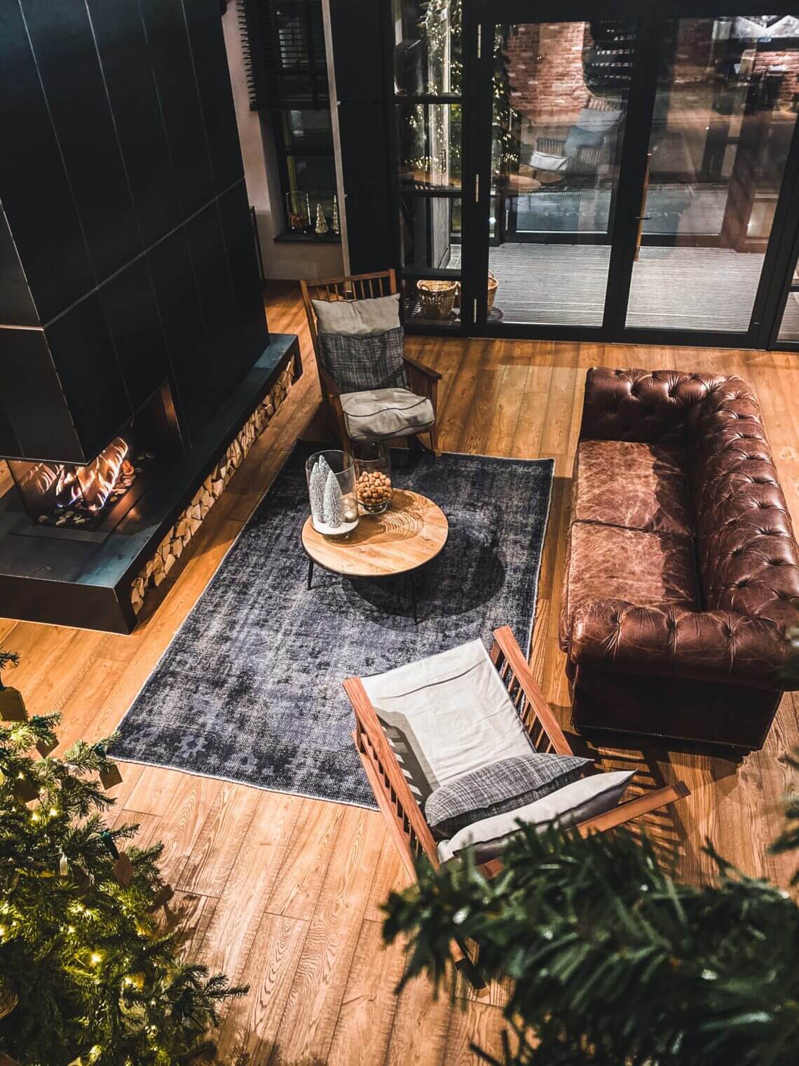 aerial shot of nordic style living room with brown sofa